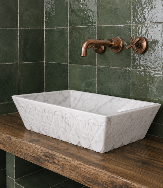 Moroccan handmade copper wall-mounted bathroom faucet with curved spout and two cross handles on green zellige tiles