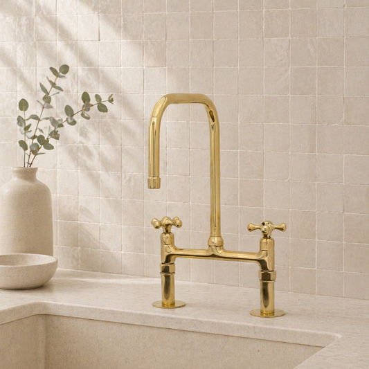 Traditional brass bridge kitchen faucet with square high-arc spout and two cross handles